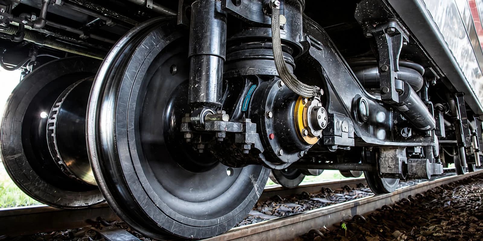 Railway rolling stock and braking systems